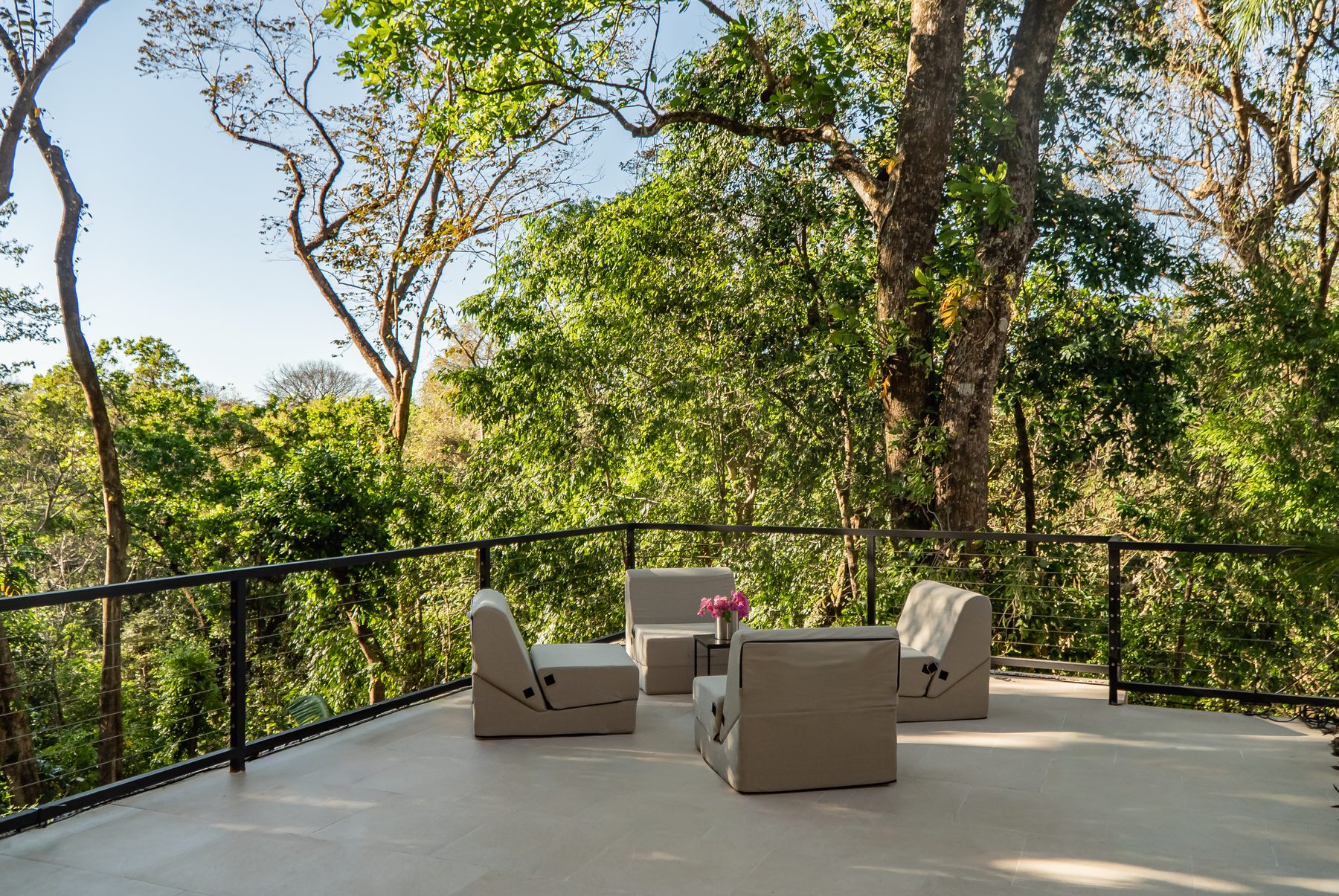 Casa Bali outdoor lounge surrounded by forest